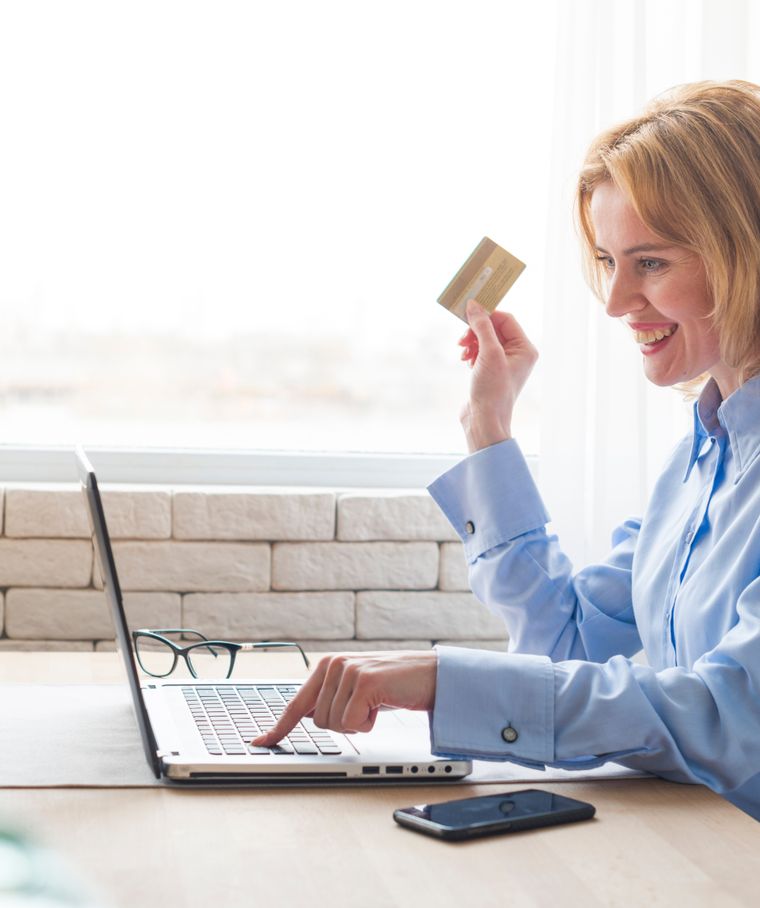 woman holding credit card
